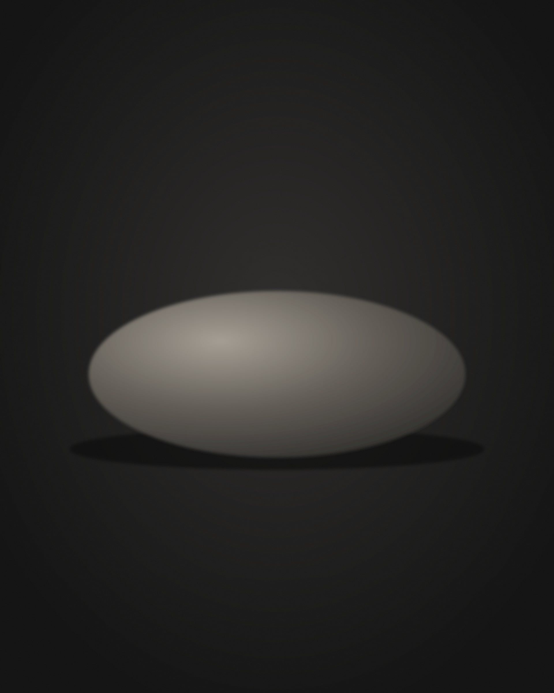 Raking light across the surface, turning scratches and wear into relief.